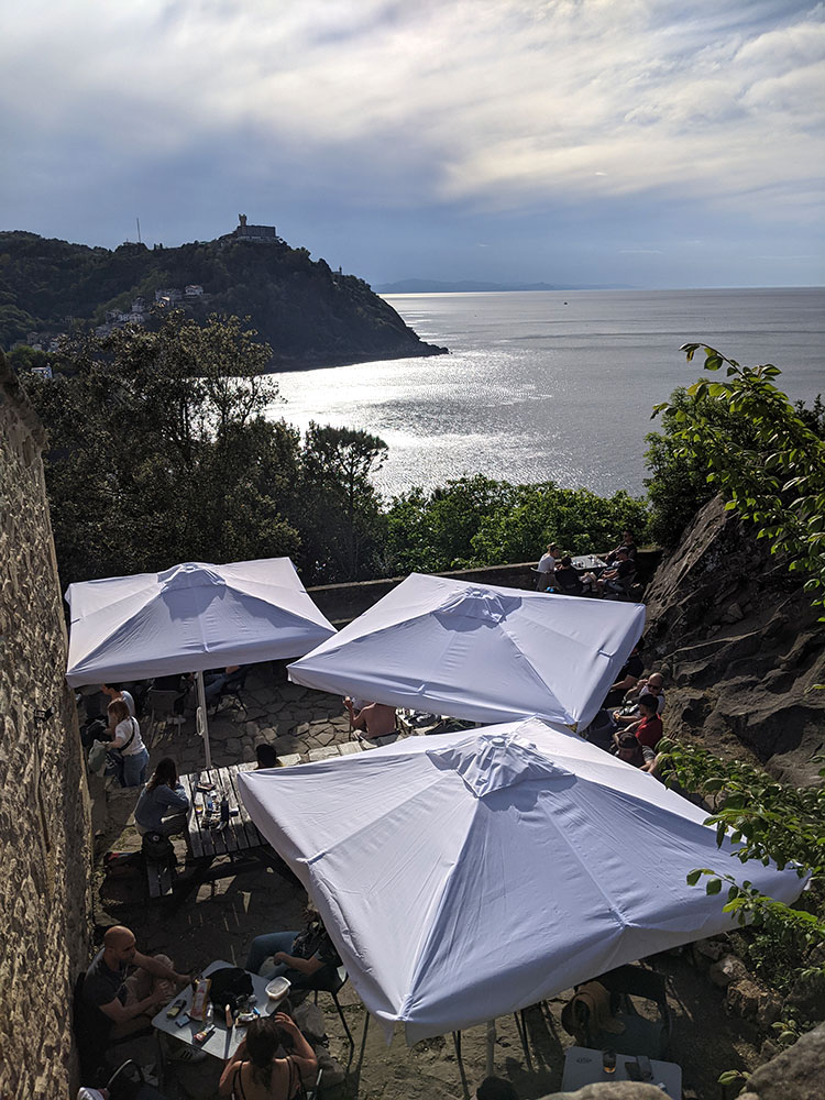 The umbrellas of El Polvorin bar on Monte Urgull