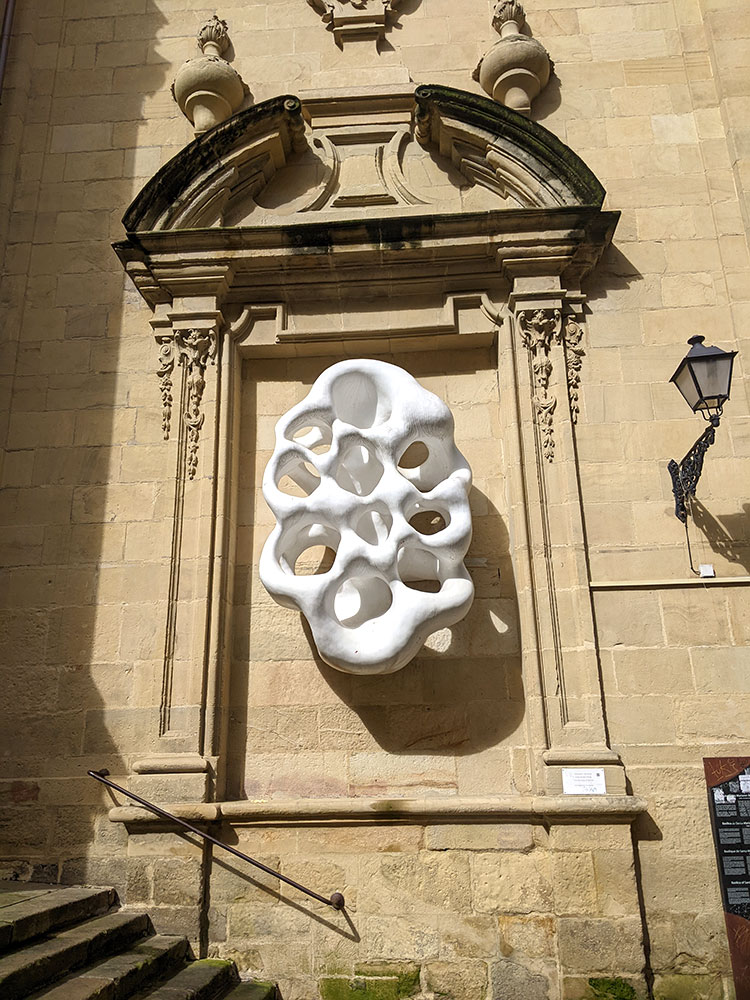 The Harmony of sound sculpture on the outside of the basilica de santa maria