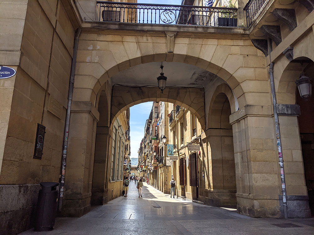 view of the narrow streets in the parte vieja in san sebastian from the constitution square