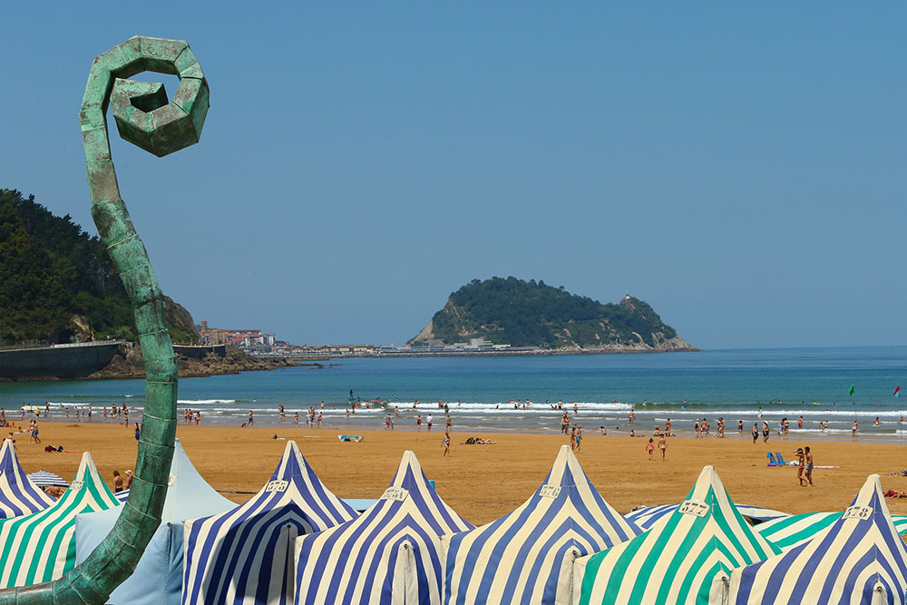 Toldos on the beach in Zarautz overlooking the mouse of Getaria